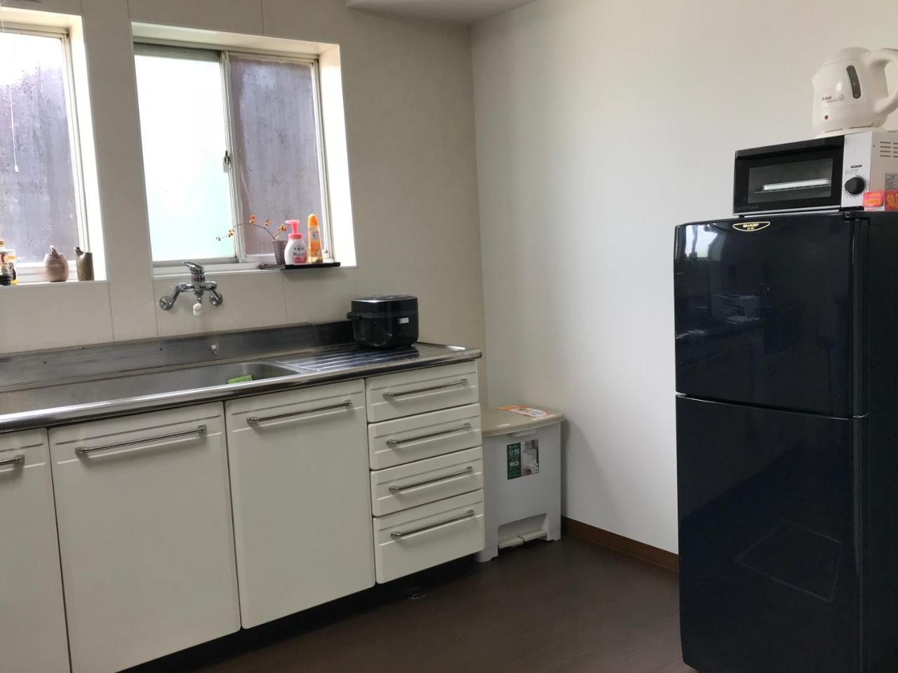 Guesthouse En Omihachiman Bagian luar foto